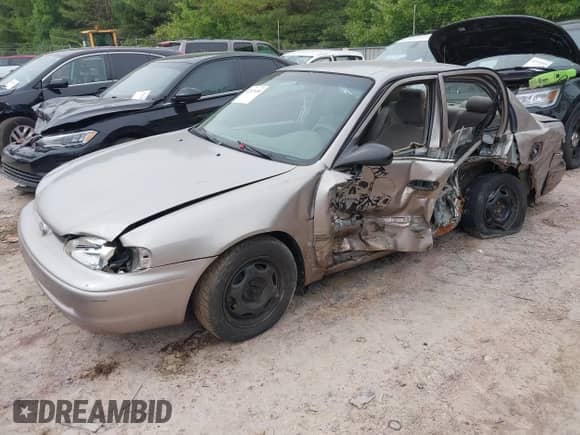 2001 Chevrolet Prizm z VIN 1Y1SK52811Z442006, wystawiony jako IAAI lot #42321680 z przebiegiem Nie podano mil oraz . Historia ofert i sprzedaży dostępna na DreamBid. Obrazek 16.