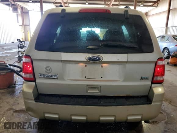 2011 Ford Escape XLT с VIN 1FMCU9DG7BKC47421, выставлен на аукционе Copart как лот 85934445 с пробегом 133 650 миль миль и Списание • Salvage title. История ставок и продаж доступна на DreamBid. Изображение 6.