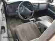 2002 Dodge Dakota SLT с VIN 1B7GL42X52S664437, выставлен на аукционе Copart как лот 50849984 с пробегом 175 062 миль миль и Списание • Salvage title. История ставок и продаж доступна на DreamBid. Изображение 8.