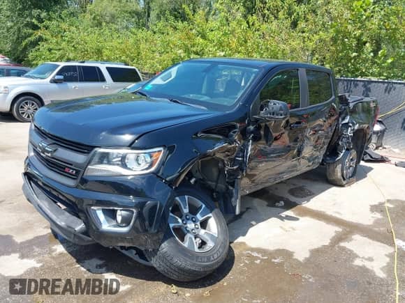 2020 Chevrolet Colorado 4WD Z71 with VIN 1GCGTDEN5L1159354, listed as a IAAI auction lot 43030671 with 81,493 mi miles and . Bid and sale history available at DreamBid. Image 20.