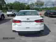 2021 Toyota Camry LE with VIN 4T1C11AK8MU601313, listed as a IAAI auction lot 43383218 with 34,384 mi miles and . Bid and sale history available at DreamBid. Image 16.