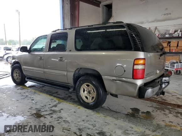 2001 Chevrolet Suburban LS z VIN 3GNEC16T01G210929, wystawiony jako Copart lot #72276304 z przebiegiem 317 653 mil mil oraz Szkoda całkowita • Salvage title. Historia ofert i sprzedaży dostępna na DreamBid. Obrazek 2.