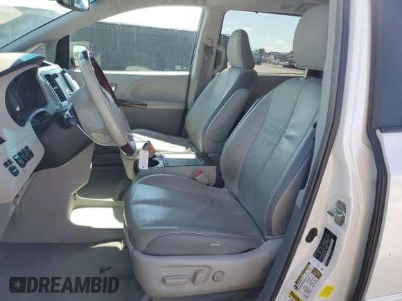 2012 Toyota Sienna XLE AAS with VIN 5TDYK3DC8CS190893, listed as a Copart auction lot 89573505 with 145,575 mi miles and Salvage title. Bid and sale history available at DreamBid. Image 7.