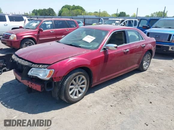 2014 Chrysler 300 C with VIN 2C3CCAEG2EH379980, listed as a IAAI auction lot 42027509 with 126,225 mi miles and . Bid and sale history available at DreamBid. Image 2.