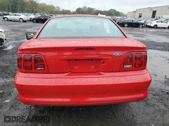 1996 Ford Mustang с VIN 1FALP4046TF159504, выставлен на аукционе Copart как лот 81761655 с пробегом 31 575 миль миль и Списание • Salvage title. История ставок и продаж доступна на DreamBid. Изображение 6.