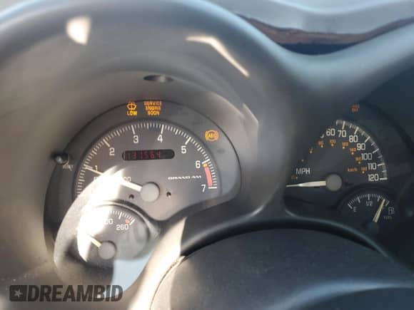 2000 Pontiac Grand Am with VIN 1G2NF12T1YM775871, listed as a Copart auction lot 70202755 with 131,564 mi miles and Clean title. Bid and sale history available at DreamBid. Image 9.