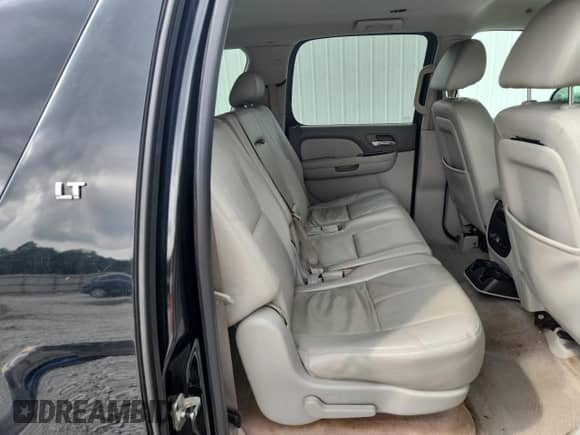 2009 Chevrolet Suburban 2LT with VIN 1GNFC26089R188805, listed as a Copart auction lot 70136265 with 180,613 mi miles and Salvage title. Bid and sale history available at DreamBid. Image 11.