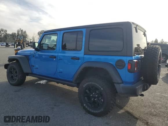 2022 Jeep Wrangler Unlimited Willys z VIN 1C4HJXDM0NW152614, wystawiony jako Copart lot #83208664 z przebiegiem 51 913 mil mil oraz Szkoda całkowita • Salvage title. Historia ofert i sprzedaży dostępna na DreamBid. Obrazek 2.
