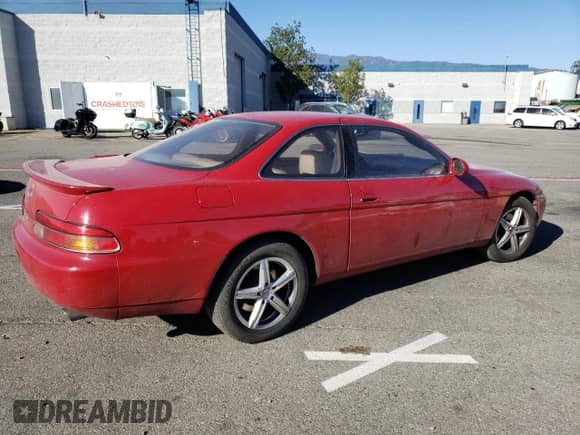 1995 Lexus SC 400 with VIN JT8UZ30C9S0045829, listed as a Copart auction lot 74985563 with 137,372 mi miles and Salvage title. Bid and sale history available at DreamBid. Image 3.
