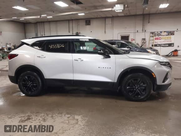 2020 Chevrolet Blazer LT z VIN 3GNKBHR46LS692566, wystawiony jako IAAI lot #42558126 z przebiegiem 73 449 mil mil oraz . Historia ofert i sprzedaży dostępna na DreamBid. Obrazek 13.