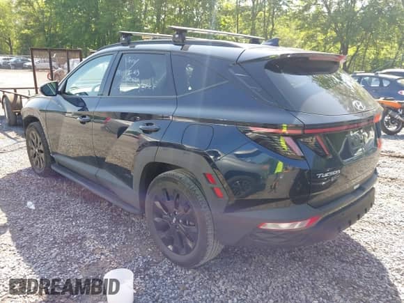 2023 Hyundai Tucson XRT with VIN KM8JFCAE5PU178564, listed as a IAAI auction lot 42522906 with 35,121 mi miles and . Bid and sale history available at DreamBid. Image 3.