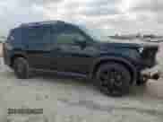 2025 Honda Pilot Black Edition с VIN 5FNYG1H99SB016676, выставлен на аукционе Copart как лот 69010935 с пробегом 9 046 миль миль и На запчасти • Non repairable. История ставок и продаж доступна на DreamBid. Изображение 4.