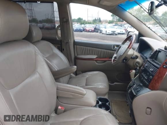 2004 Toyota Sienna XLE z VIN 5TDZA22C04S101369, wystawiony jako IAAI lot #43247039 z przebiegiem 256 193 mil mil oraz . Historia ofert i sprzedaży dostępna na DreamBid. Obrazek 5.