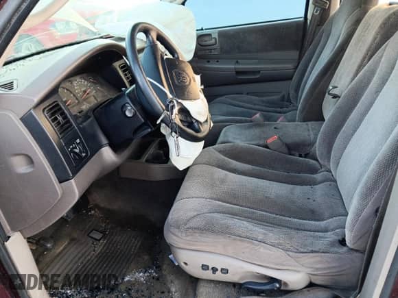 2002 Dodge Dakota SLT z VIN 1B7HG48N92S592088, wystawiony jako Copart lot #66957145 z przebiegiem 227 873 mil mil oraz Nie do naprawy • Non repairable. Historia ofert i sprzedaży dostępna na DreamBid. Obrazek 7.
