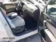 2021 Volkswagen Tiguan SE with VIN 3VV3B7AX2MM084659, listed as a IAAI auction lot 43050149 with 66,676 mi miles and . Bid and sale history available at DreamBid. Image 5.