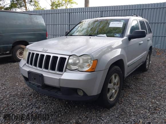 2009 Jeep Grand Cherokee Laredo with VIN 1J8GR48KX9C524150, listed as a IAAI auction lot 43272859 with 168,624 mi miles and . Bid and sale history available at DreamBid. Image 2.