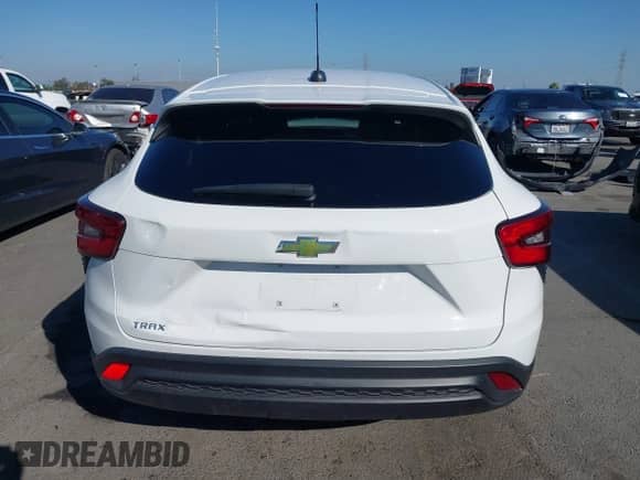 2024 Chevrolet Trax LS with VIN KL77LFE24RC097070, listed as a IAAI auction lot 43398755 with 14,932 mi miles and . Bid and sale history available at DreamBid. Image 16.