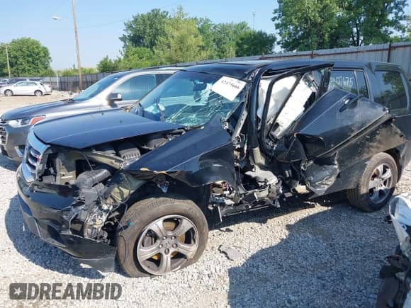 2013 Honda Pilot EX-L with VIN 5FNYF4H67DB045560, listed as a IAAI auction lot 42475666 with 108,938 mi miles and . Bid and sale history available at DreamBid. Image 6.