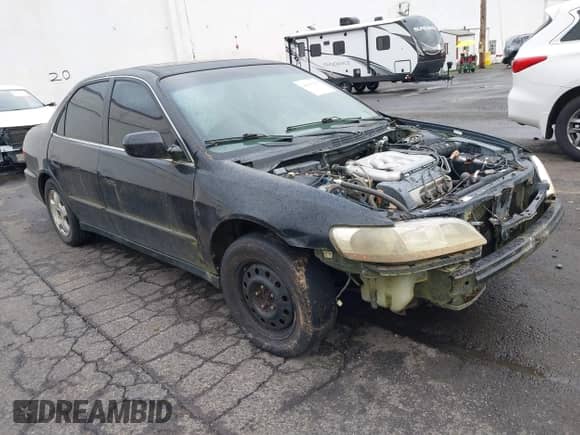 1999 Honda Accord EX with VIN 1HGCG1653XA047790, listed as a IAAI auction lot 40801906 with 266,561 mi miles and . Bid and sale history available at DreamBid. Image 1.