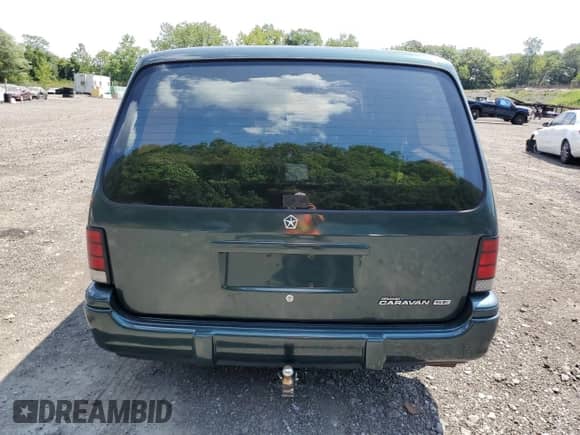1993 Dodge Caravan Grand SE with VIN 1B4GH44RXPX587393, listed as a Copart auction lot 68863525 with 108,301 mi miles and Salvage title. Bid and sale history available at DreamBid. Image 6.