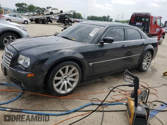 2006 Chrysler 300 C SRT-8 z VIN 2C3LA73W76H102777, wystawiony jako Copart lot #60065925 z przebiegiem 97 765 mil mil oraz Szkoda całkowita • Salvage title. Historia ofert i sprzedaży dostępna na DreamBid. Obrazek 1.