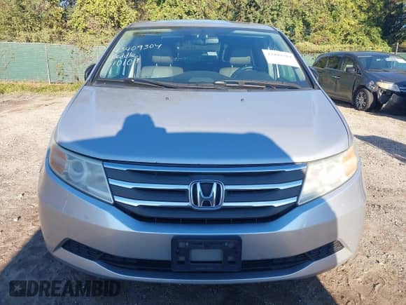 2013 Honda Odyssey EX-L with VIN 5FNRL5H65DB025620, listed as a IAAI auction lot 43409304 with 211,932 mi miles and . Bid and sale history available at DreamBid. Image 12.