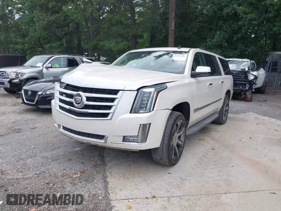 2015 Cadillac Escalade ESV Luxury with VIN 1GYS3HKJ0FR179756, listed as a IAAI auction lot 42597381 with 129,682 mi miles and . Bid and sale history available at DreamBid. Image 2.