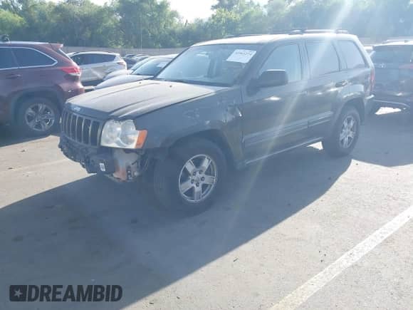2006 Jeep Grand Cherokee Laredo with VIN 1J4HR48NX6C229822, listed as a IAAI auction lot 42561274 with 206,056 mi miles and . Bid and sale history available at DreamBid. Image 18.