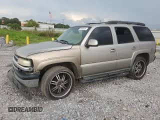 2002 Chevrolet Tahoe Z71 with VIN 1GNEK13Z62R175469, listed as a Copart auction lot 68968635 with 302,078 mi miles and Salvage title. Bid and sale history available at DreamBid. Image 1.