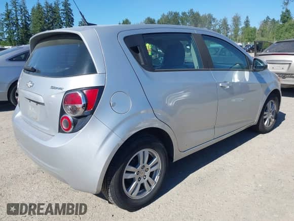 2012 Chevrolet Sonic LS with VIN 1G1JB6SH4C4138828, listed as a IAAI auction lot 42467481 with 168,266 mi miles and . Bid and sale history available at DreamBid. Image 4.