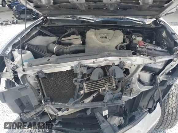 2020 Toyota Tacoma SR5 с VIN 5TFAZ5CN1LX090978, выставлен на аукционе Copart как лот 64010265 с пробегом 117 433 миль миль и Списание • Salvage title. История ставок и продаж доступна на DreamBid. Изображение 11.