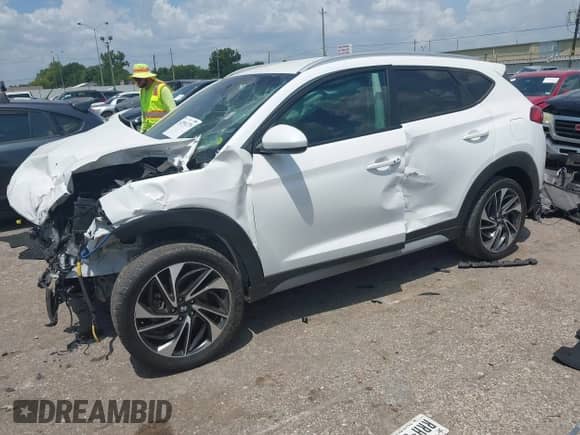 2021 Hyundai Tucson Ultimate with VIN KM8J33AL5MU353009, listed as a IAAI auction lot 42991279 with 36,492 mi miles and . Bid and sale history available at DreamBid. Image 2.
