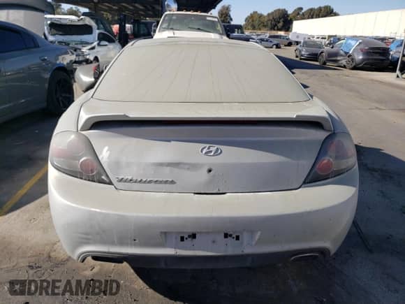 2008 Hyundai Tiburon GS с VIN KMHHM66D38U295664, выставлен на аукционе Copart как лот 73983794 с пробегом 170 134 миль миль и Списание • Salvage title. История ставок и продаж доступна на DreamBid. Изображение 6.