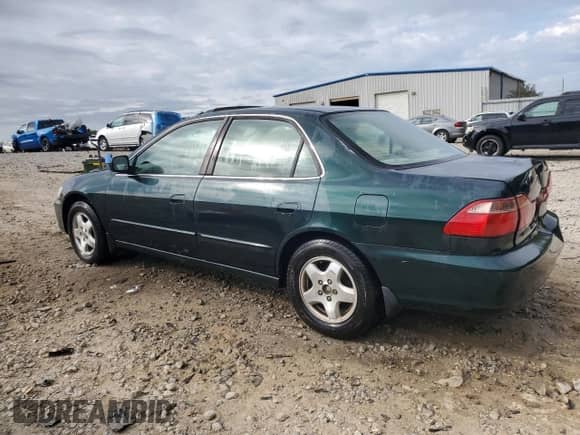 1999 Honda Accord EX with VIN 1HGCG1651XA064572, listed as a Copart auction lot 85878025 with 312,538 mi miles and Salvage title. Bid and sale history available at DreamBid. Image 2.
