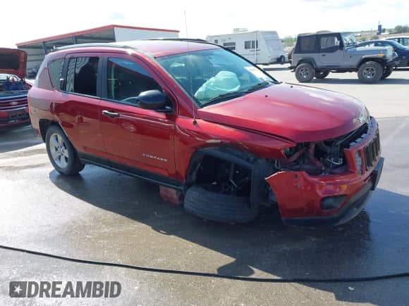 2014 Jeep Compass Latitude with VIN 1C4NJCEB4ED651713, listed as a IAAI auction lot 43305790 with 139,289 mi miles and . Bid and sale history available at DreamBid. Image 1.
