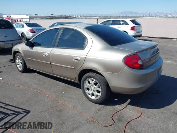 2000 Dodge Neon Highline z VIN 1B3ES46C5YD722773, wystawiony jako IAAI lot #43142303 z przebiegiem 91 601 mil mil oraz . Historia ofert i sprzedaży dostępna na DreamBid. Obrazek 3.