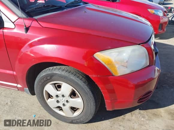 2009 Dodge Caliber SE с VIN 1B3HB28A19D251686, выставлен на аукционе IAAI как лот 41236137 с пробегом 182 034 миль миль и . История ставок и продаж доступна на DreamBid. Изображение 17.