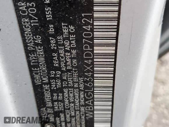 2004 BMW 7 Series 745i with VIN WBAGL634X4DP70421, listed as a Copart auction lot 73309744 with 123,457 mi miles and Salvage title. Bid and sale history available at DreamBid. Image 12.