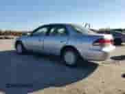 2002 Honda Accord LX with VIN 1HGCG56462A019991, listed as a Copart auction lot 90265405 with 176,773 mi miles and Clean title. Bid and sale history available at DreamBid. Image 2.