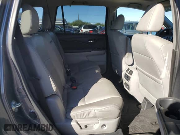 2017 Honda Pilot Touring с VIN 5FNYF5H96HB003659, выставлен на аукционе Copart как лот 86496755 с пробегом Не указан миль и Списание • Salvage title. История ставок и продаж доступна на DreamBid. Изображение 11.