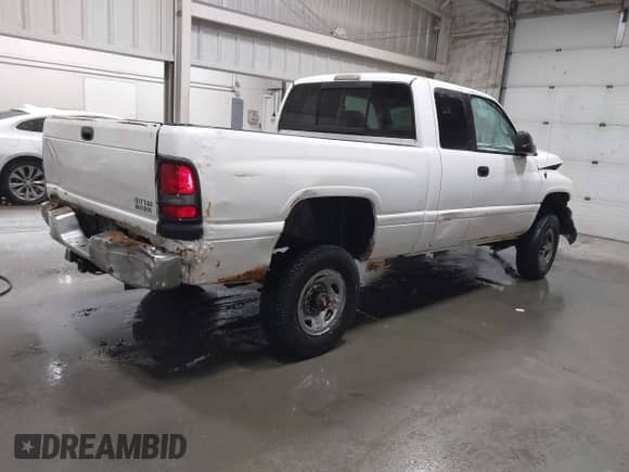 1999 Dodge 2500 with VIN 3B7KF2365XG244445, listed as a IAAI auction lot 41880557 with Not provided miles and . Bid and sale history available at DreamBid. Image 4.