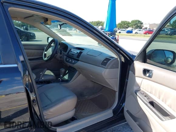 2005 Toyota Camry STD with VIN 4T1BE32K95U033195, listed as a IAAI auction lot 43485665 with 168,249 mi miles and . Bid and sale history available at DreamBid. Image 5.