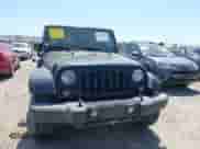 2015 Jeep Wrangler Sport with VIN 1C4AJWAGXFL650428, listed as a IAAI auction lot 42010629 with 80,039 mi miles and . Bid and sale history available at DreamBid. Image 12.