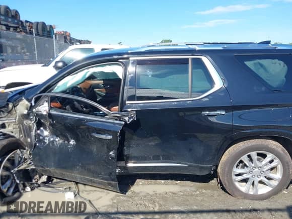 2018 Chevrolet Traverse High Country with VIN 1GNEVKKW5JJ102353, listed as a IAAI auction lot 43124176 with 110,000 mi miles and . Bid and sale history available at DreamBid. Image 14.