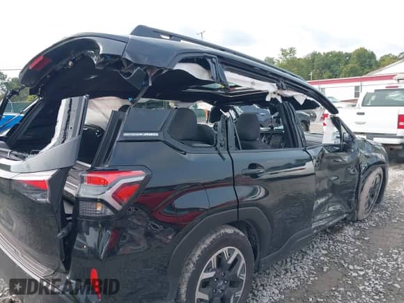 2025 Subaru Forester Premium z VIN JF2SLDDC5SH487391, wystawiony jako IAAI lot #43154703 z przebiegiem 3 099 mil mil oraz . Historia ofert i sprzedaży dostępna na DreamBid. Obrazek 20.