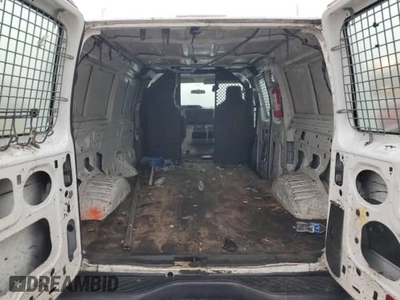 2012 Ford Econoline Cargo Recreational with VIN 1FTNE2EL7CDB25094, listed as a Copart auction lot 42137285 with 304,976 mi miles and Salvage title. Bid and sale history available at DreamBid. Image 10.