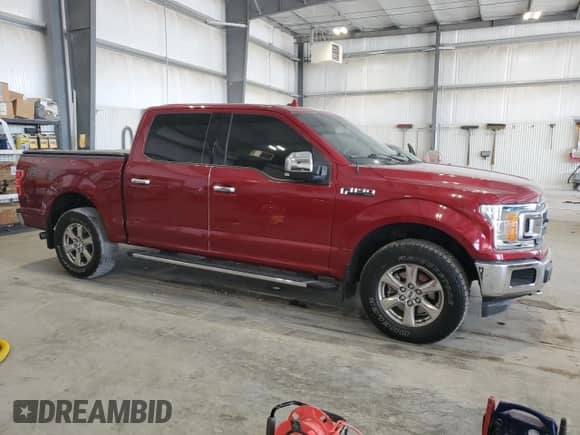 2018 Ford F-150 XL with VIN 1FTEW1EP1JFB44302, listed as a Copart auction lot 70579955 with 94,422 mi miles and Salvage title. Bid and sale history available at DreamBid. Image 4.