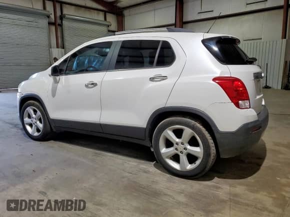 2015 Chevrolet Trax LTZ z VIN KL7CJNSB4FB249742, wystawiony jako Copart lot #85187075 z przebiegiem 212 083 mil mil oraz Czysty tytuł • Clean title. Historia ofert i sprzedaży dostępna na DreamBid. Obrazek 2.