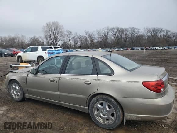 2003 Saturn LS with VIN 1G8JW54R33Y525353, listed as a Copart auction lot 86838924 with 142,254 mi miles and Salvage title. Bid and sale history available at DreamBid. Image 2.