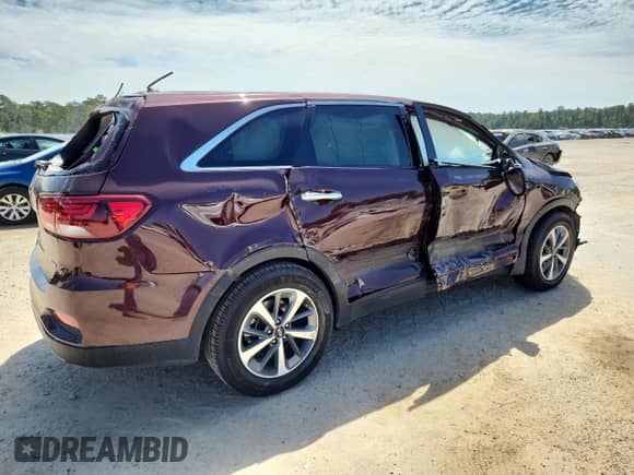 2020 Kia Sorento LX z VIN 5XYPG4A59LG672844, wystawiony jako Copart lot #80087145 z przebiegiem Nie podano mil oraz Szkoda całkowita • Salvage title. Historia ofert i sprzedaży dostępna na DreamBid. Obrazek 3.